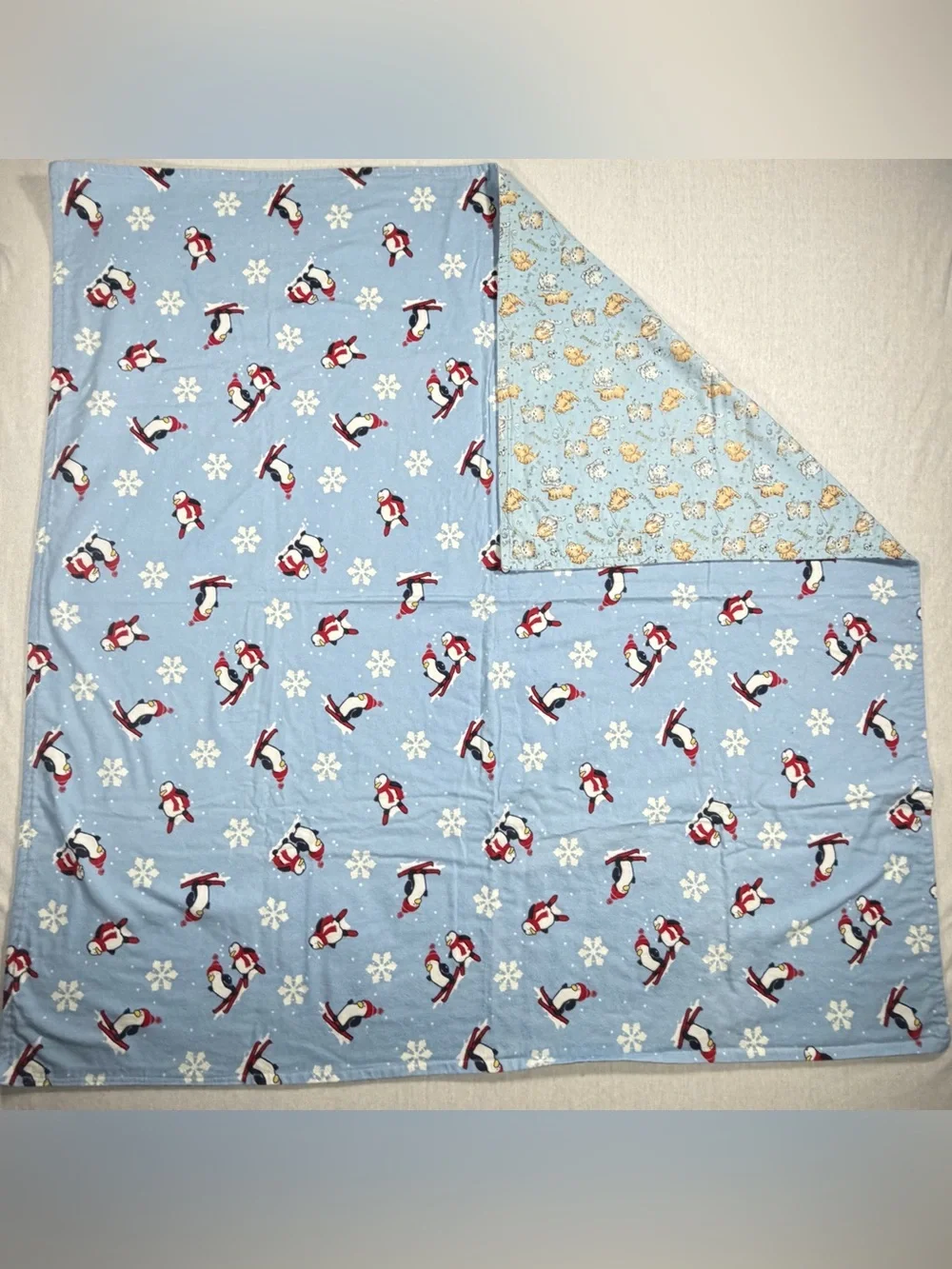Light Blue Reversible Penguin & Animal Print Quilt Throw